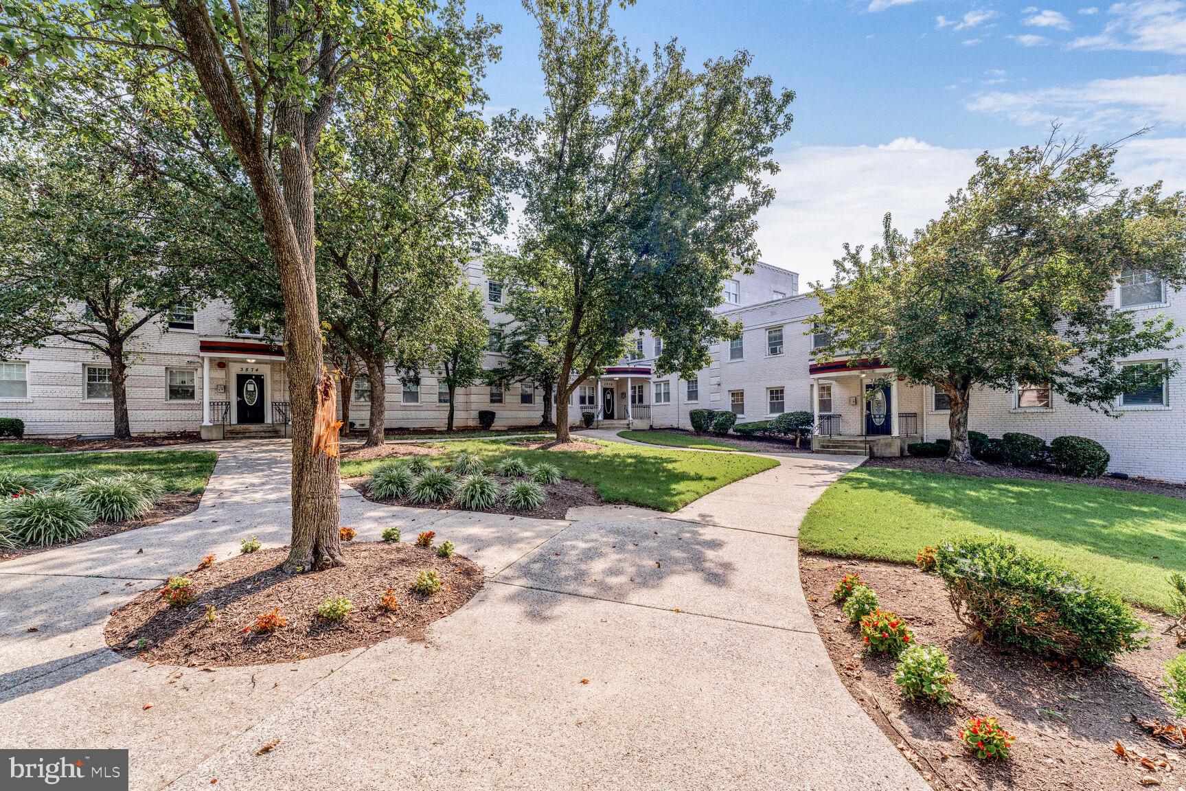 3876 9th Street Southeast, Unit 301 Washington, DC 20032 - Photo 2 of 16 a view of a park with plants and trees