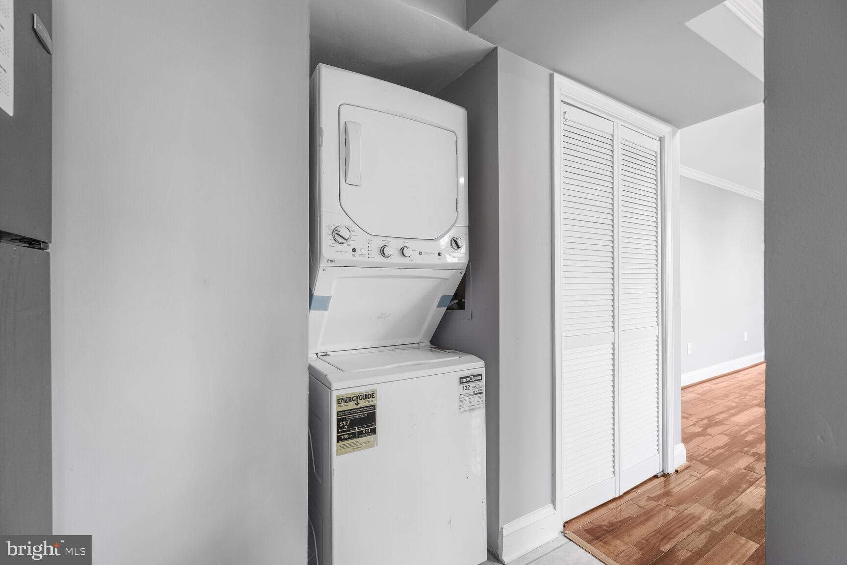 3876 9th Street Southeast, Unit 301 Washington, DC 20032 - Photo 6 of 16 a utility room with dryer and washer