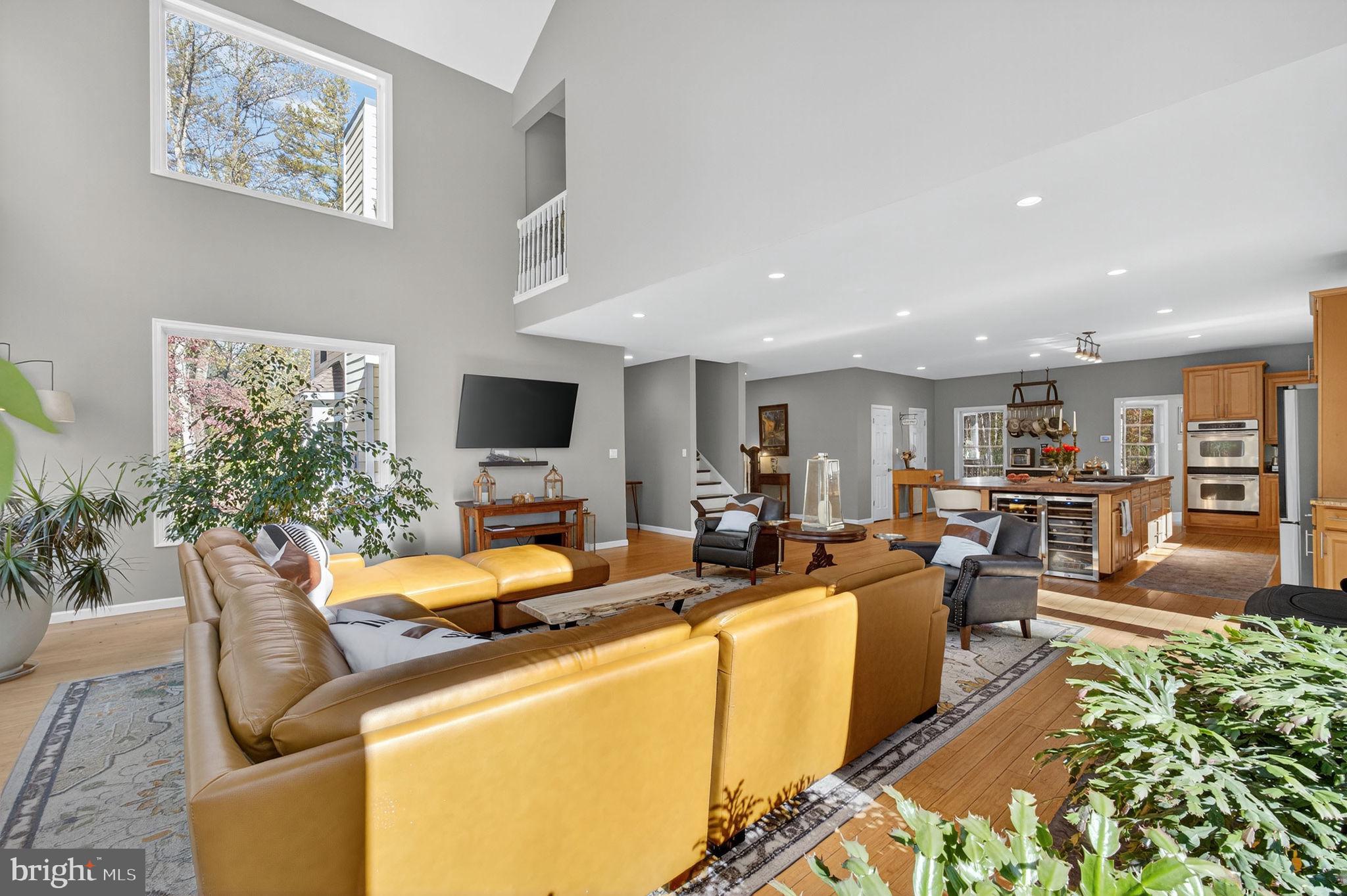 700 Battle Mountain Road Amissville, VA 20106 - Photo 14 of 64 a living room with furniture and a flat screen tv
