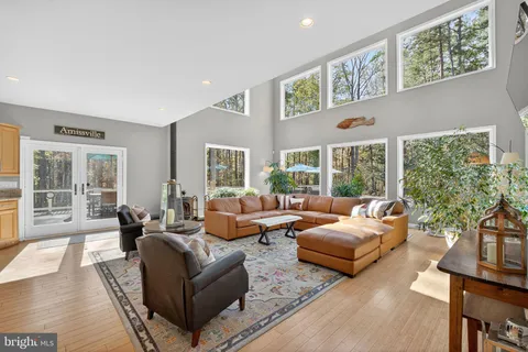 a view of balcony with couch and wooden floor