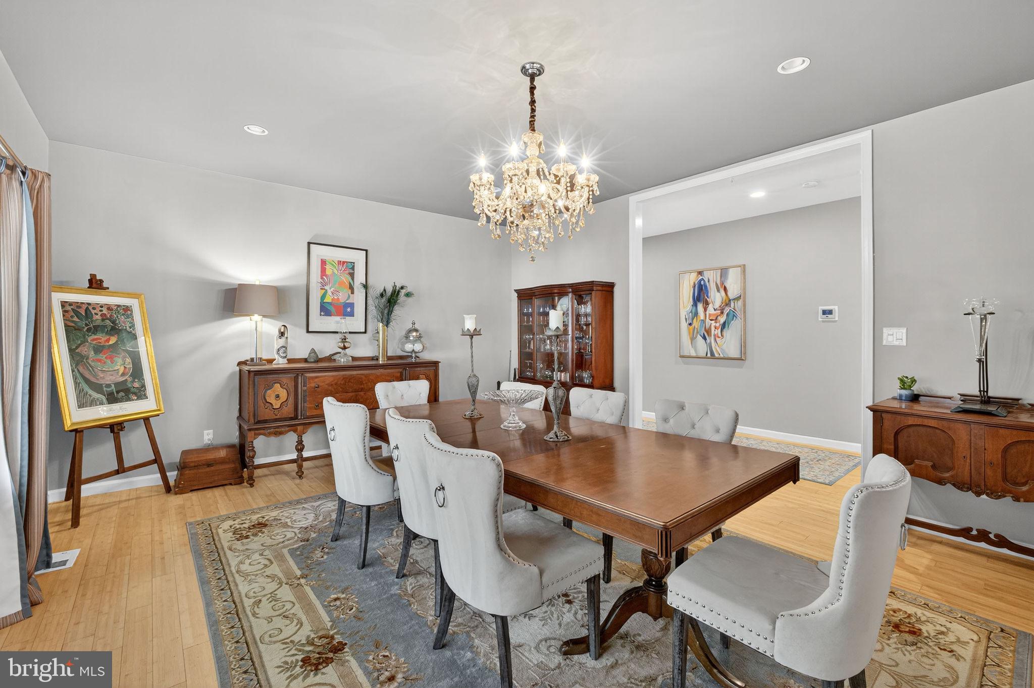 700 Battle Mountain Road Amissville, VA 20106 - Photo 22 of 64 a view of a dining room with furniture and chandelier