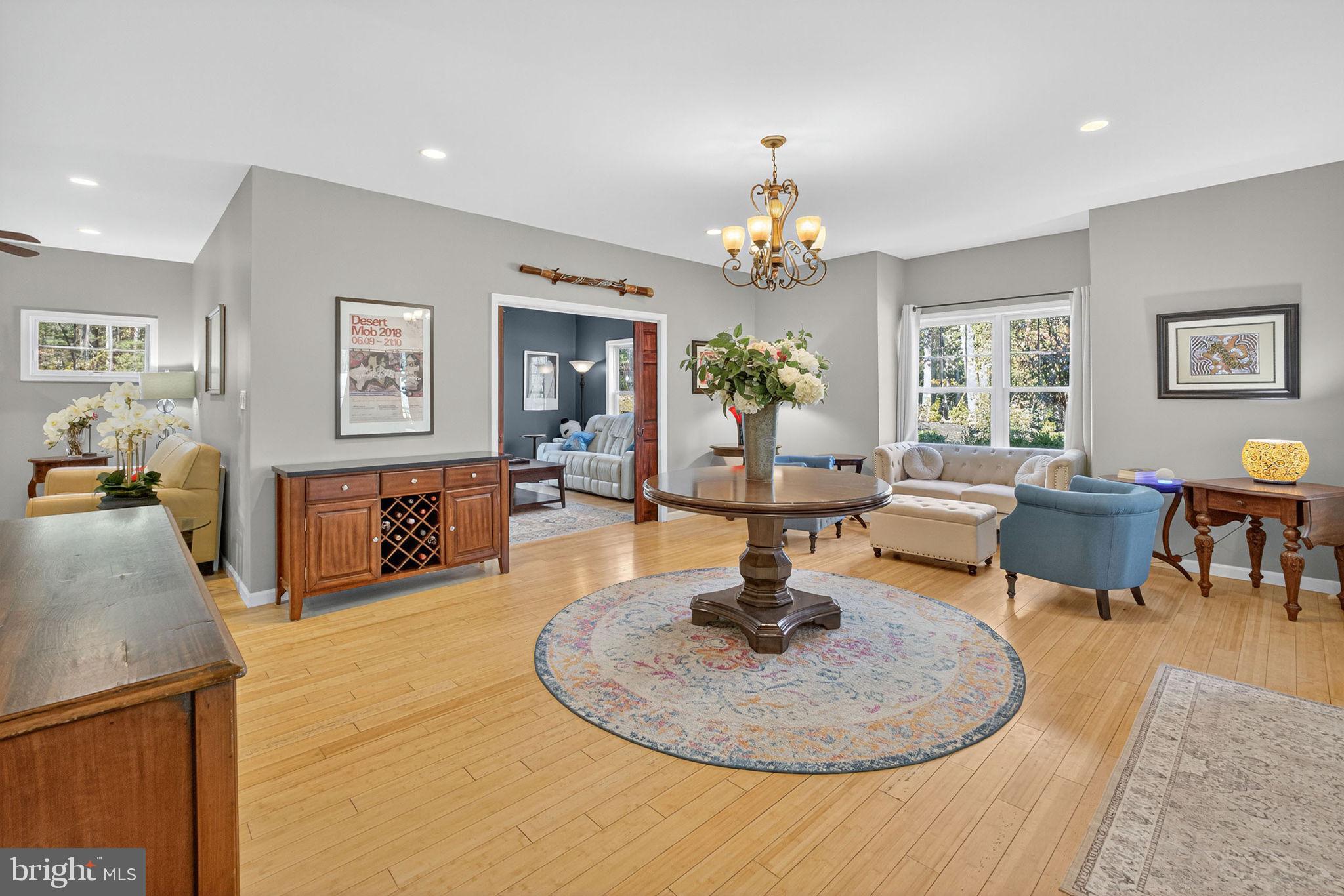 700 Battle Mountain Road Amissville, VA 20106 - Photo 24 of 64 a living room with fireplace furniture and a dining table