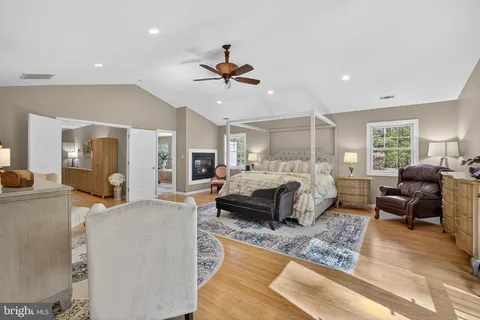 a bath tub sitting in a bathroom next to a window