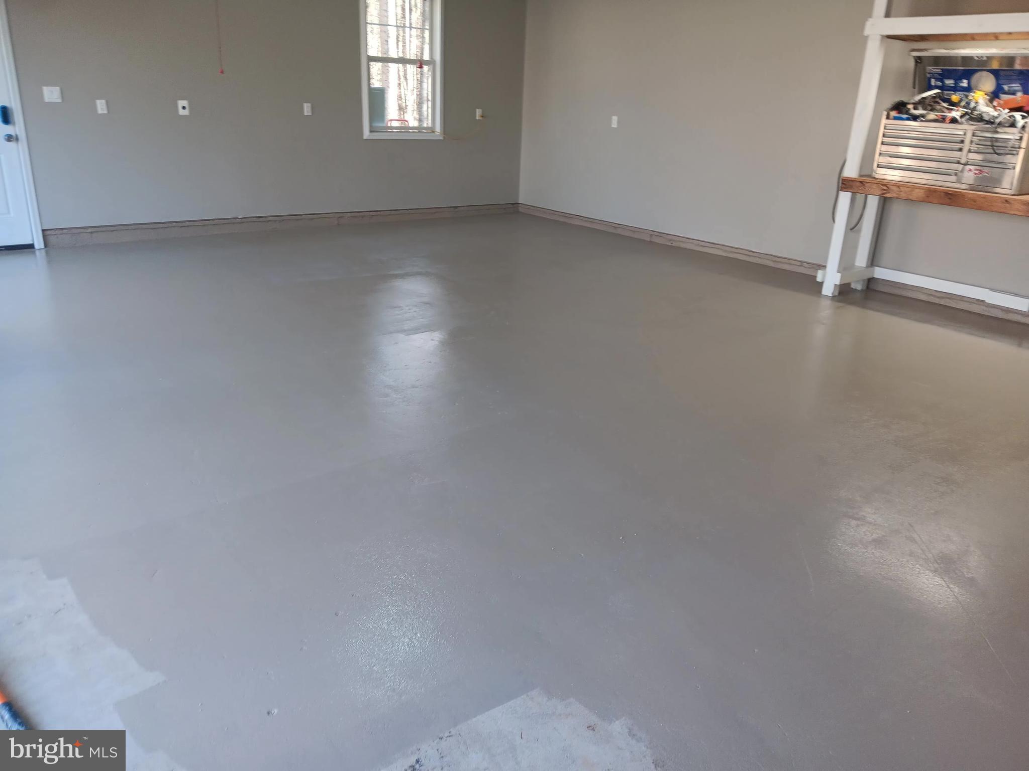 700 Battle Mountain Road Amissville, VA 20106 - Photo 49 of 64 wooden floor in an empty room with a window