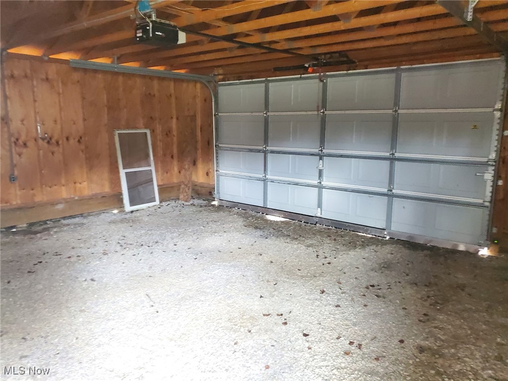 9985 Franchester Road Lodi, OH 44254 - Photo 15 of 24 Garage featuring a garage door opener (no remotes)
