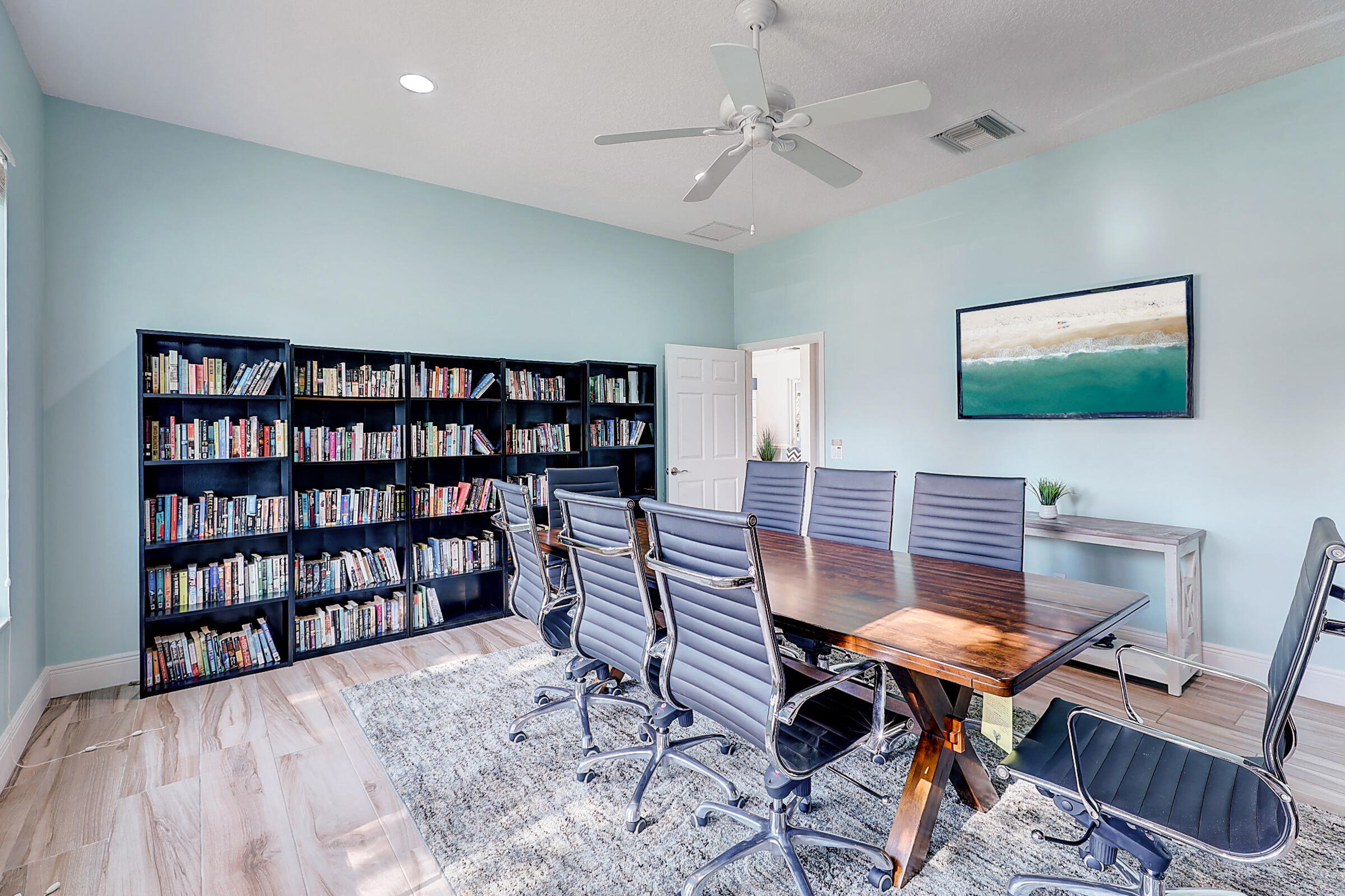 511 Northwest Red Pine Way Jensen Beach, FL 34957 - Photo 47 of 60 a workspace with furniture