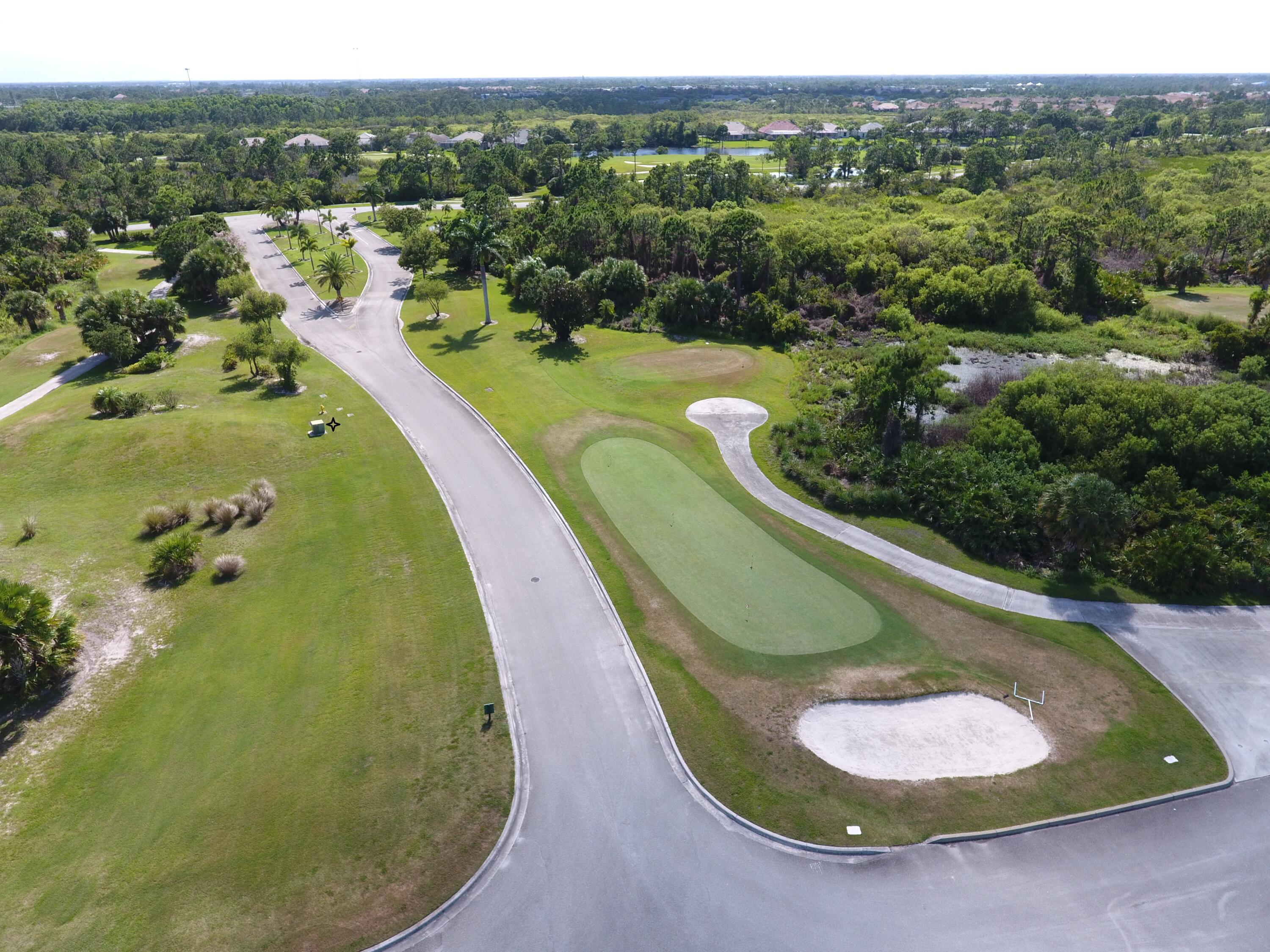 511 Northwest Red Pine Way Jensen Beach, FL 34957 - Photo 55 of 60 an aerial view of a swimming pool