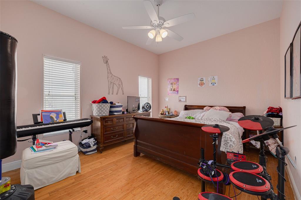 8100 Brighton Drive Port Richey, FL 34668 - Photo 25 of 68 a bed room with a bed and a window