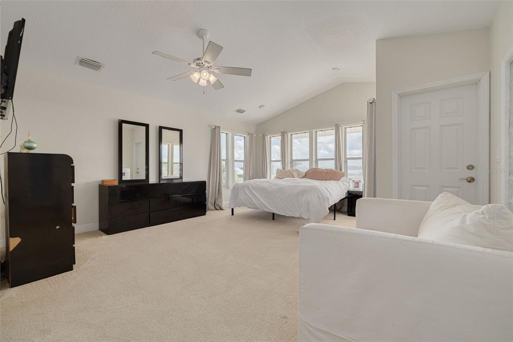 8100 Brighton Drive Port Richey, FL 34668 - Photo 42 of 68 a living room with furniture and a flat screen tv