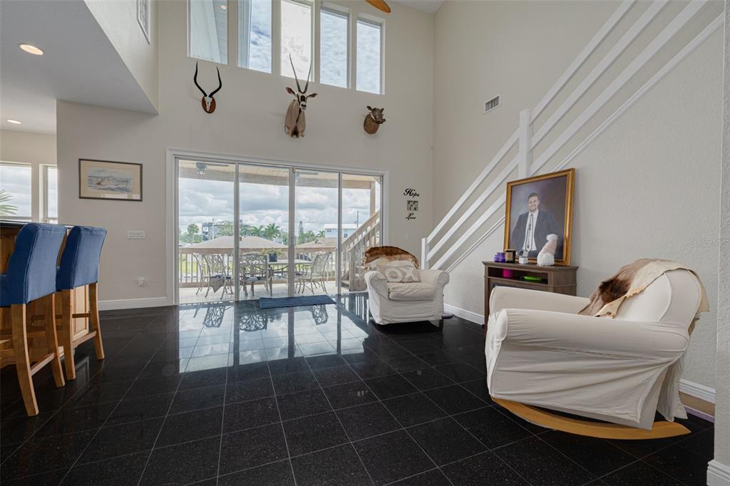 8100 Brighton Drive Port Richey, FL 34668 - Photo 54 of 68 a living room with furniture and a large window