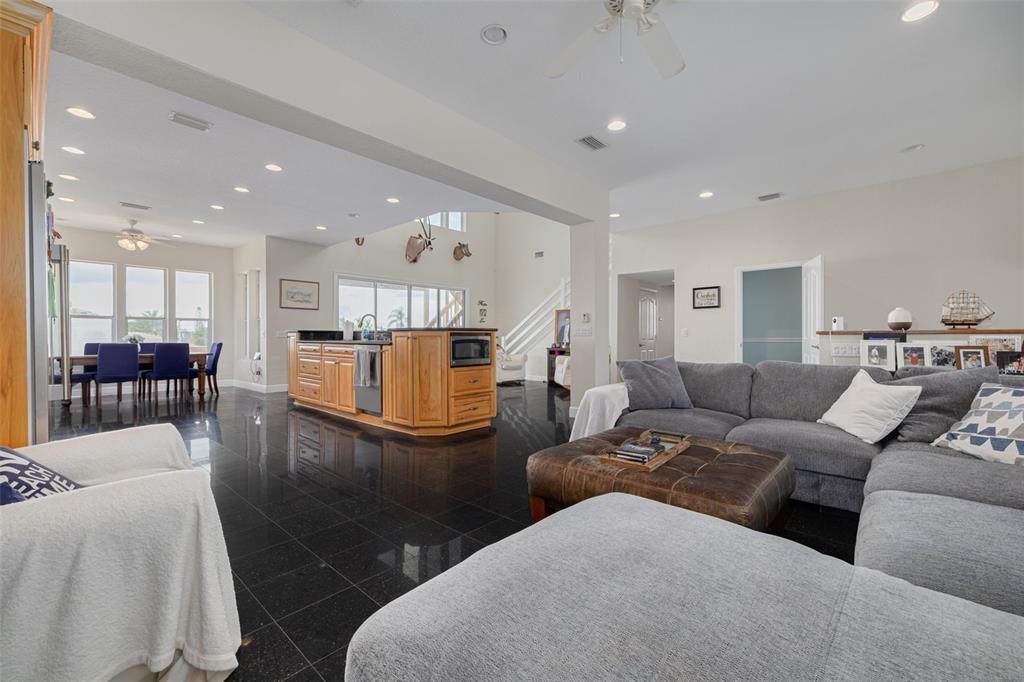 8100 Brighton Drive Port Richey, FL 34668 - Photo 55 of 68 a living room with furniture and a table