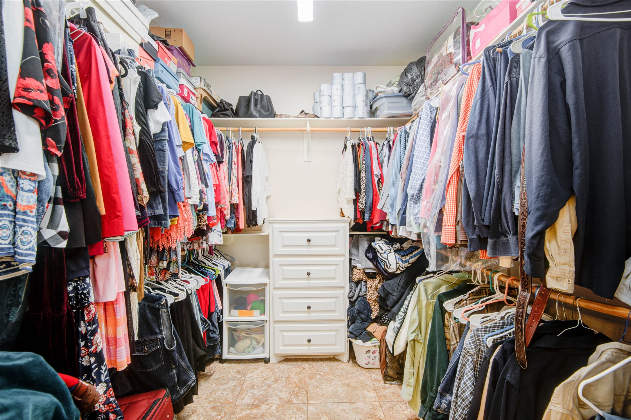 24910 Farm To Market 2004 Angleton, TX 77515 - Photo 23 of 50 a view of walk in closet with clothes