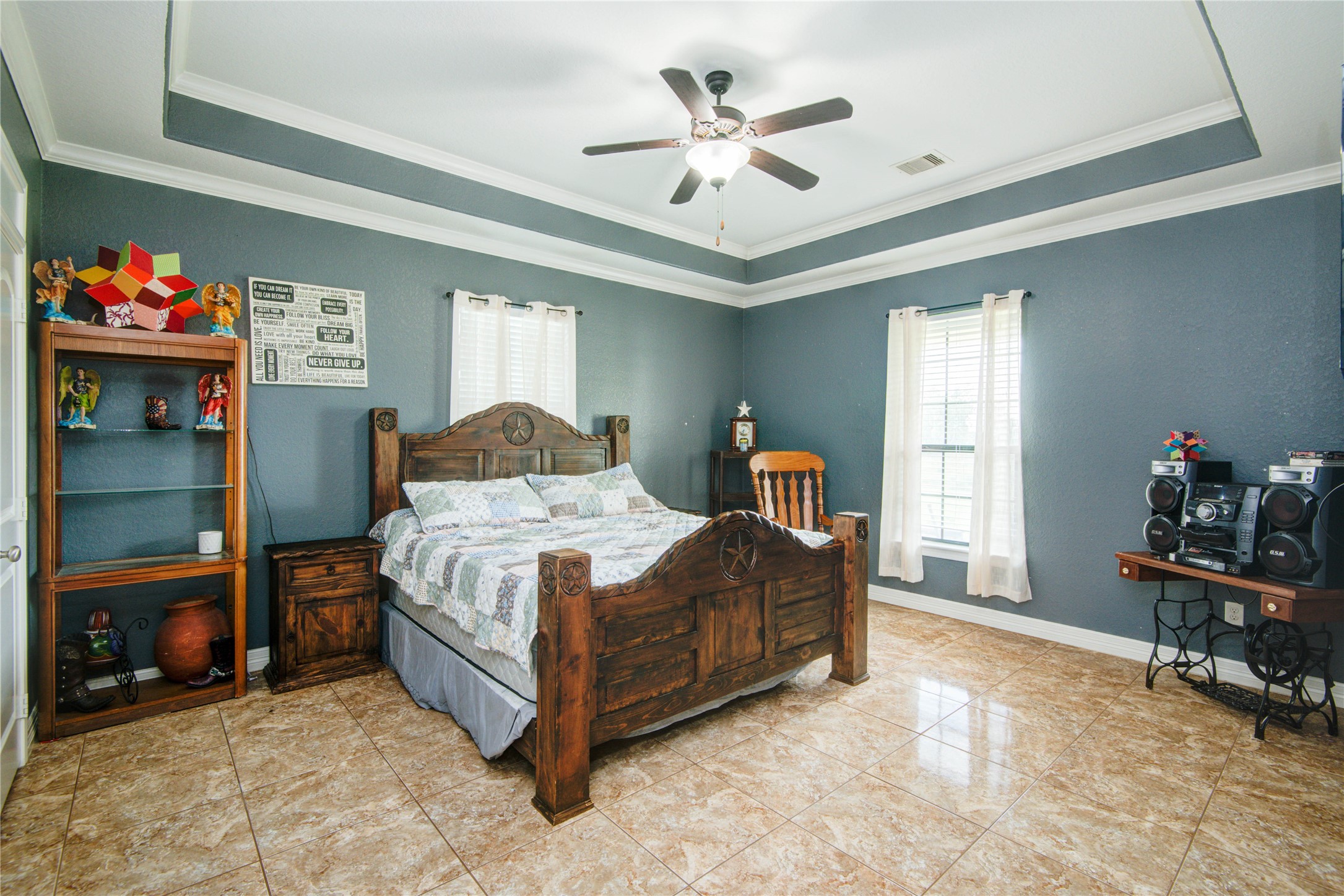 24910 Farm To Market 2004 Angleton, TX 77515 - Photo 27 of 50 a bedroom with a bed and a desk