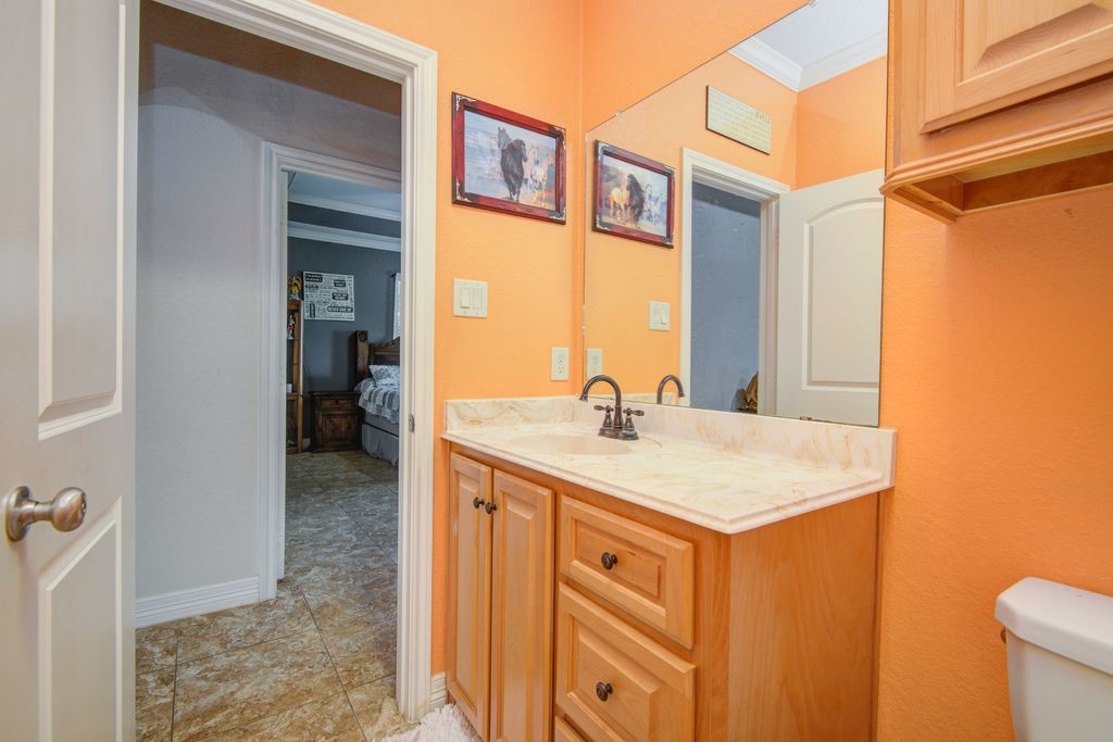 24910 Farm To Market 2004 Angleton, TX 77515 - Photo 30 of 50 a bathroom with a sink toilet and shower