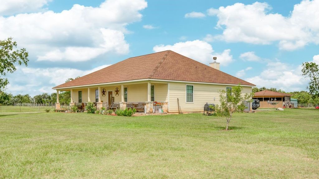 24910 Farm To Market 2004 Angleton, TX 77515 - Photo 4 of 50 a view of a house with a yard