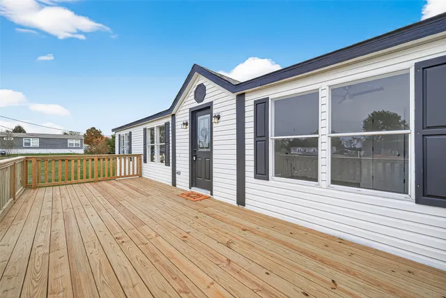 a view of a house with wooden floor
