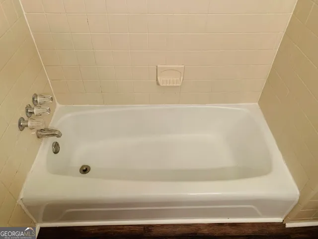 a bathroom with a bathtub
