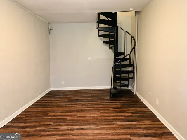 a view of entryway with wooden floor