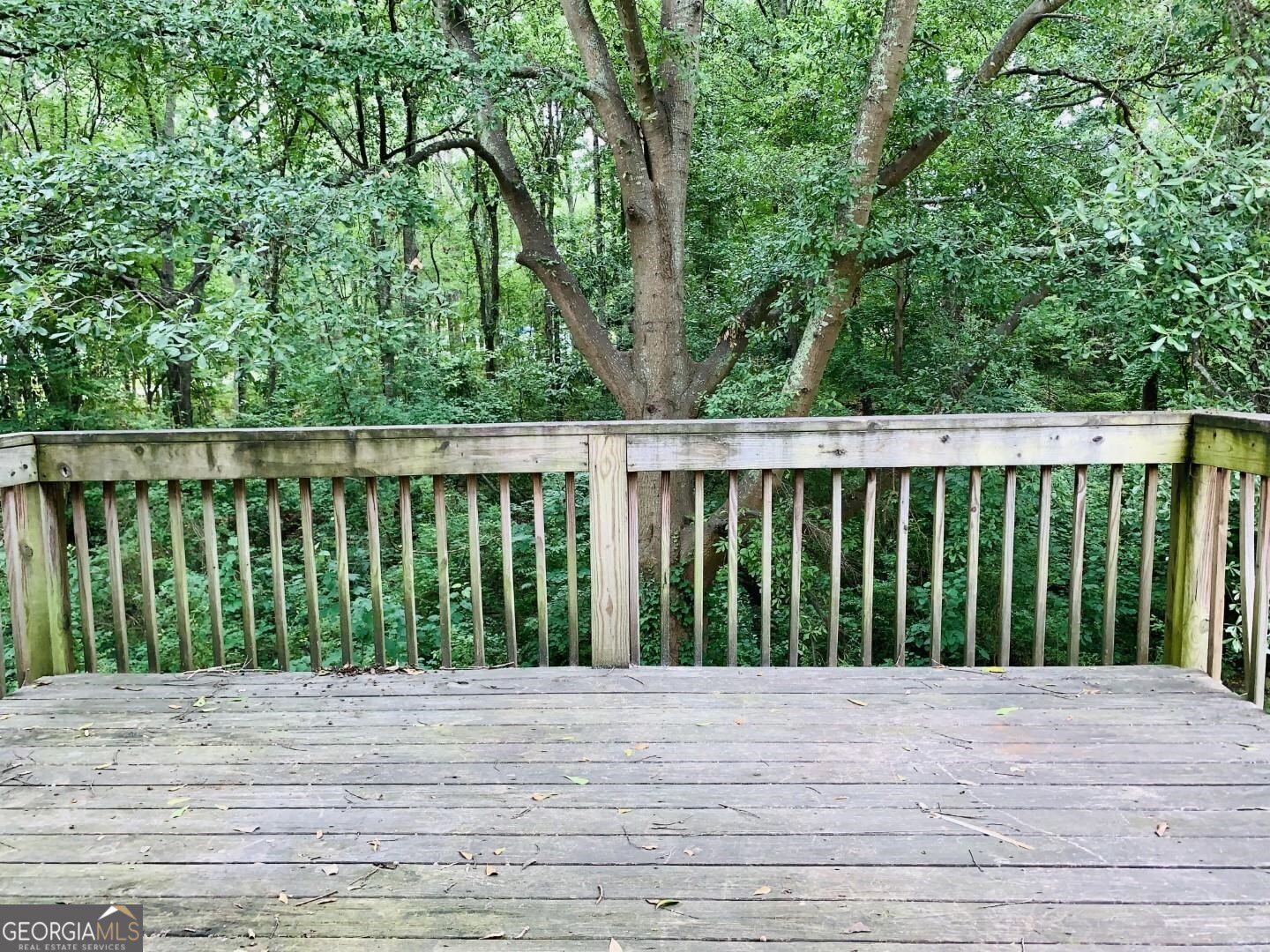 1069 Laurel Lane Northwest, Unit B Conyers, GA 30012 - Photo 28 of 28 a view of a wooden deck