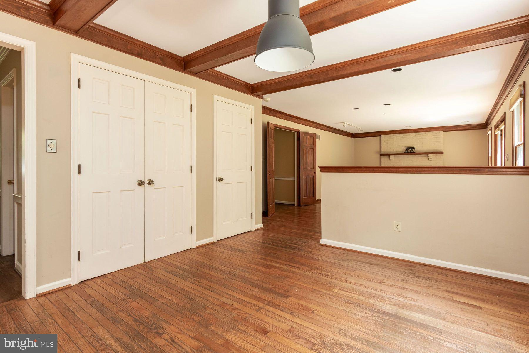 4887 Danielle Drive Doylestown, PA 18902 - Photo 21 of 35 a view of a hallway with wooden floor