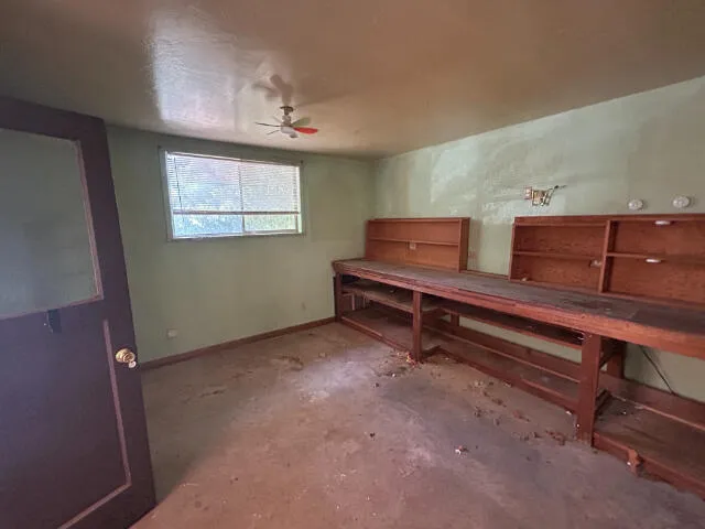 a room with furniture and window