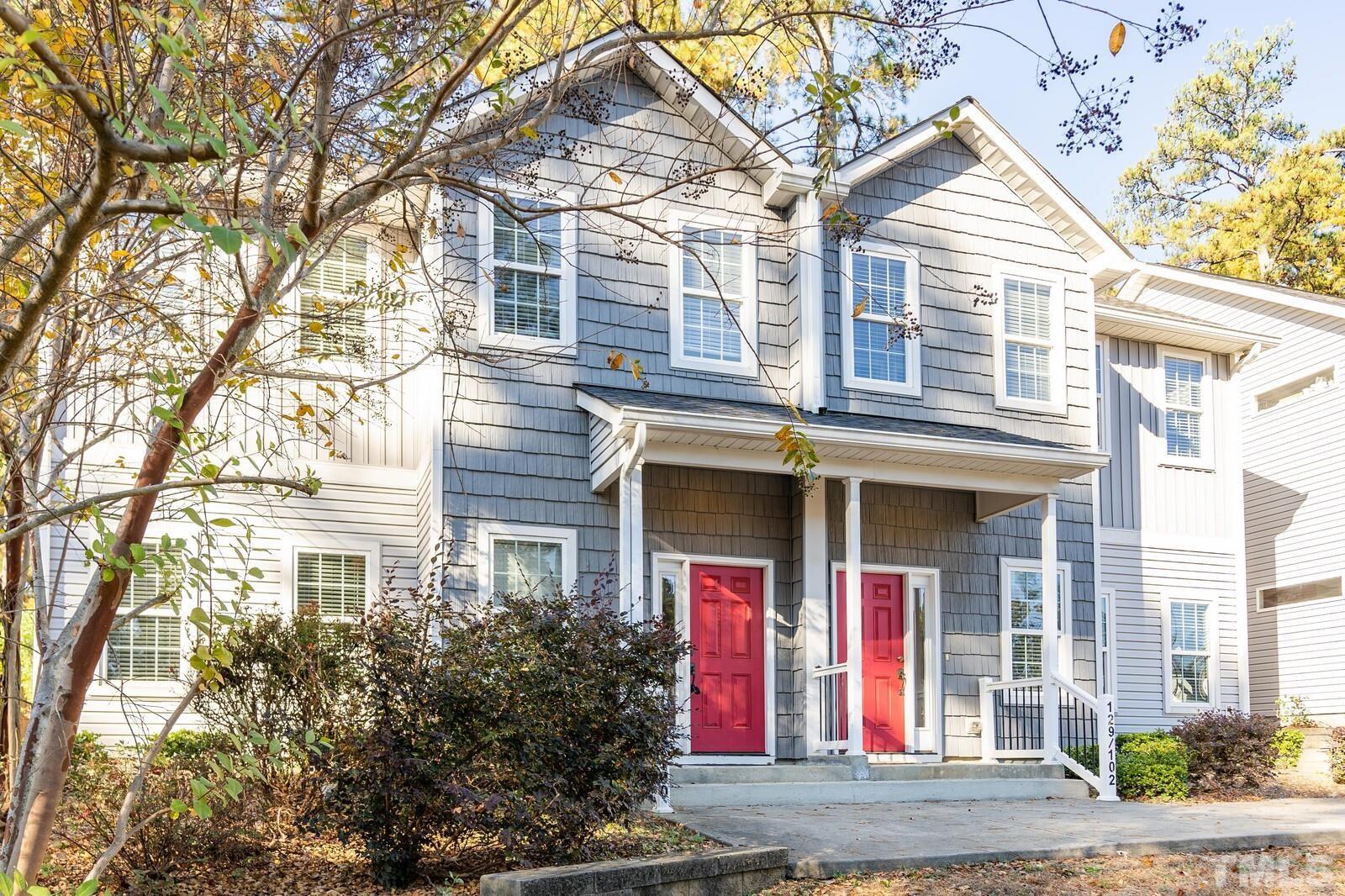 129 Pineland Circle, Unit 100 Raleigh, NC 27606 - Photo 1 of 29 front view of a brick house