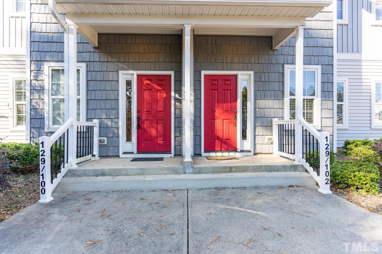 129 Pineland Circle, Unit 100 Raleigh, NC 27606 - Photo 2 of 29 a view of a brick building with entryway