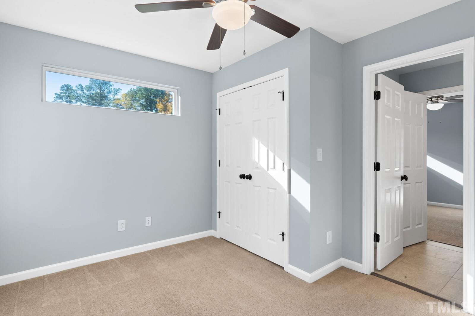 129 Pineland Circle, Unit 100 Raleigh, NC 27606 - Photo 13 of 29 a view of an empty room