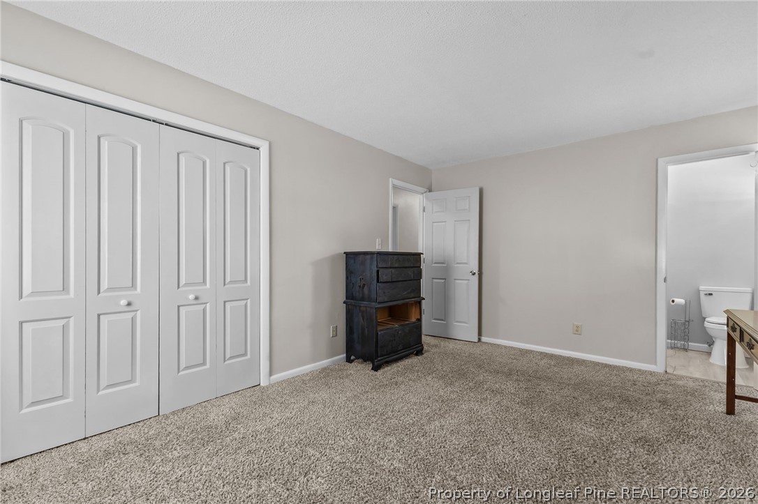 908 Ruton Court Fayetteville, NC 28303 - Photo 19 of 29 a view of an empty room with a cabinet