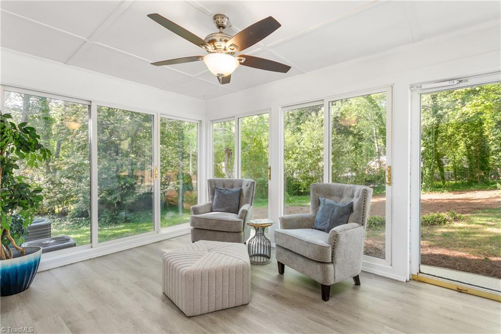 1803 Red Forest Road Greensboro, NC 27410 - Photo 15 of 35 Multi-season sun porch overlooks backyard
