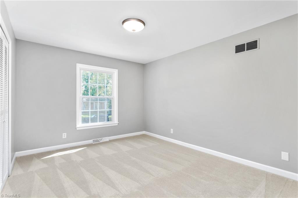 1803 Red Forest Road Greensboro, NC 27410 - Photo 23 of 35 2nd main level bedroom