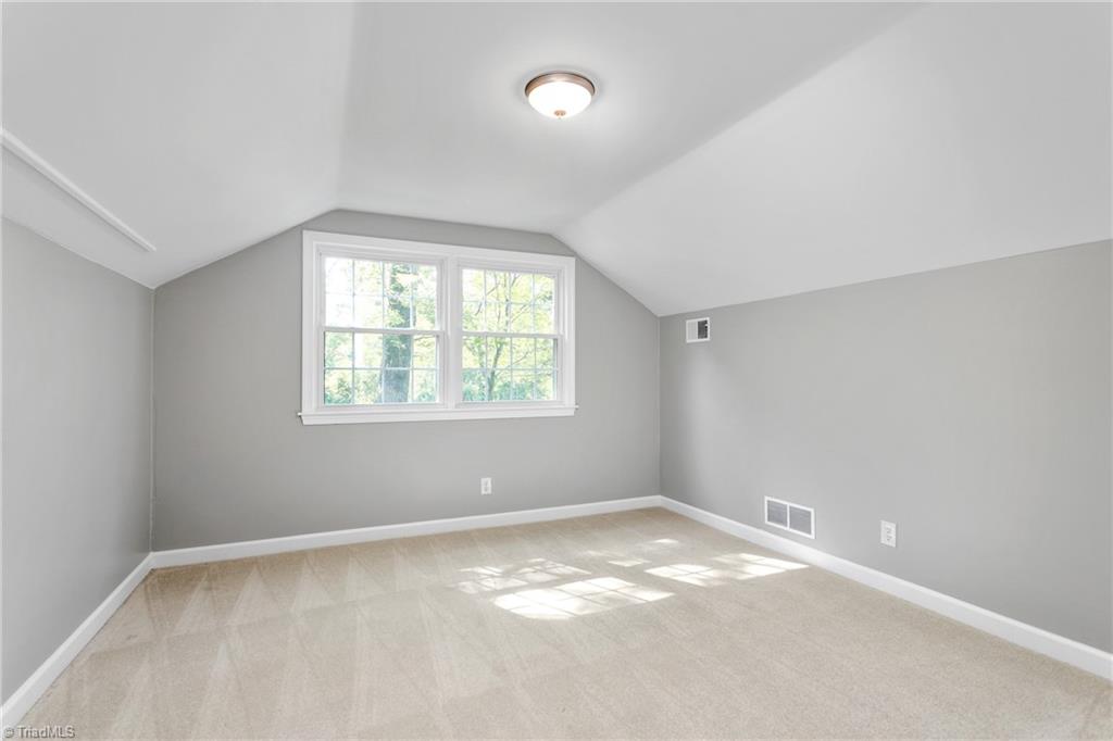 1803 Red Forest Road Greensboro, NC 27410 - Photo 28 of 35 Upper level, one of two bedrooms