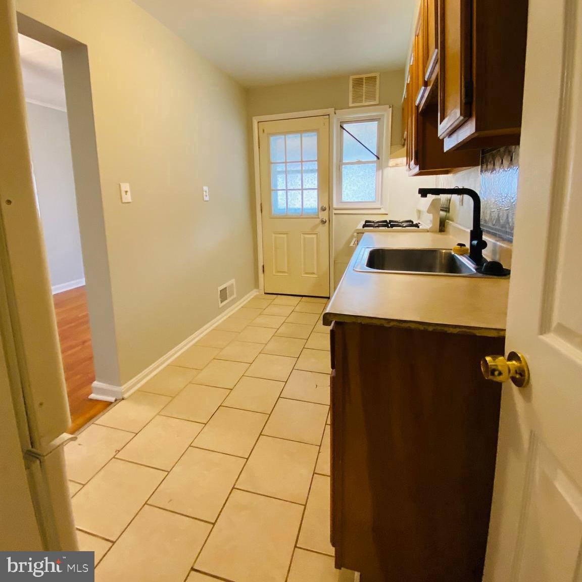 2073 Jasmine Road Dundalk, MD 21222 - Photo 6 of 12 a utility room with dryer and washer