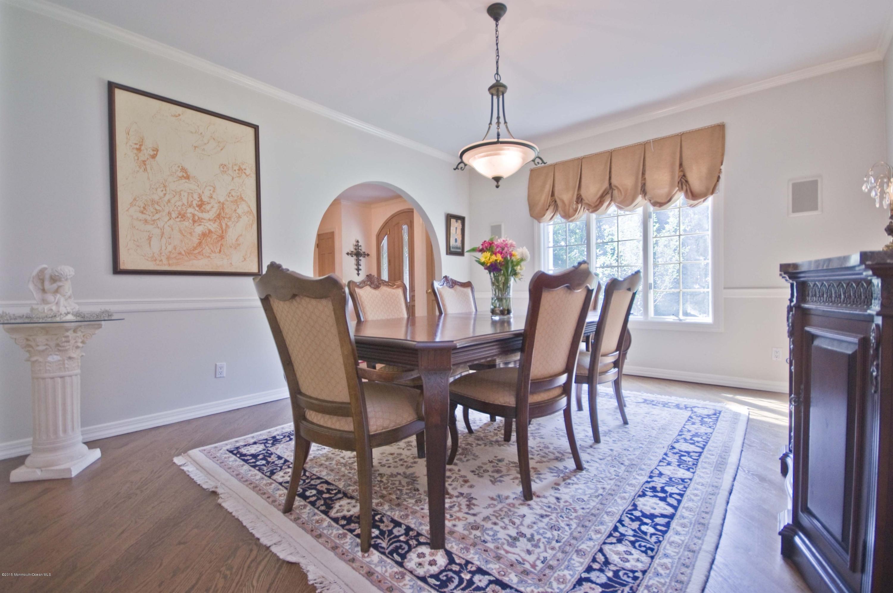 48 Crow Hill Road Freehold, NJ 07728 - Photo 11 of 29 a view of a dining room with furniture window and wooden floor