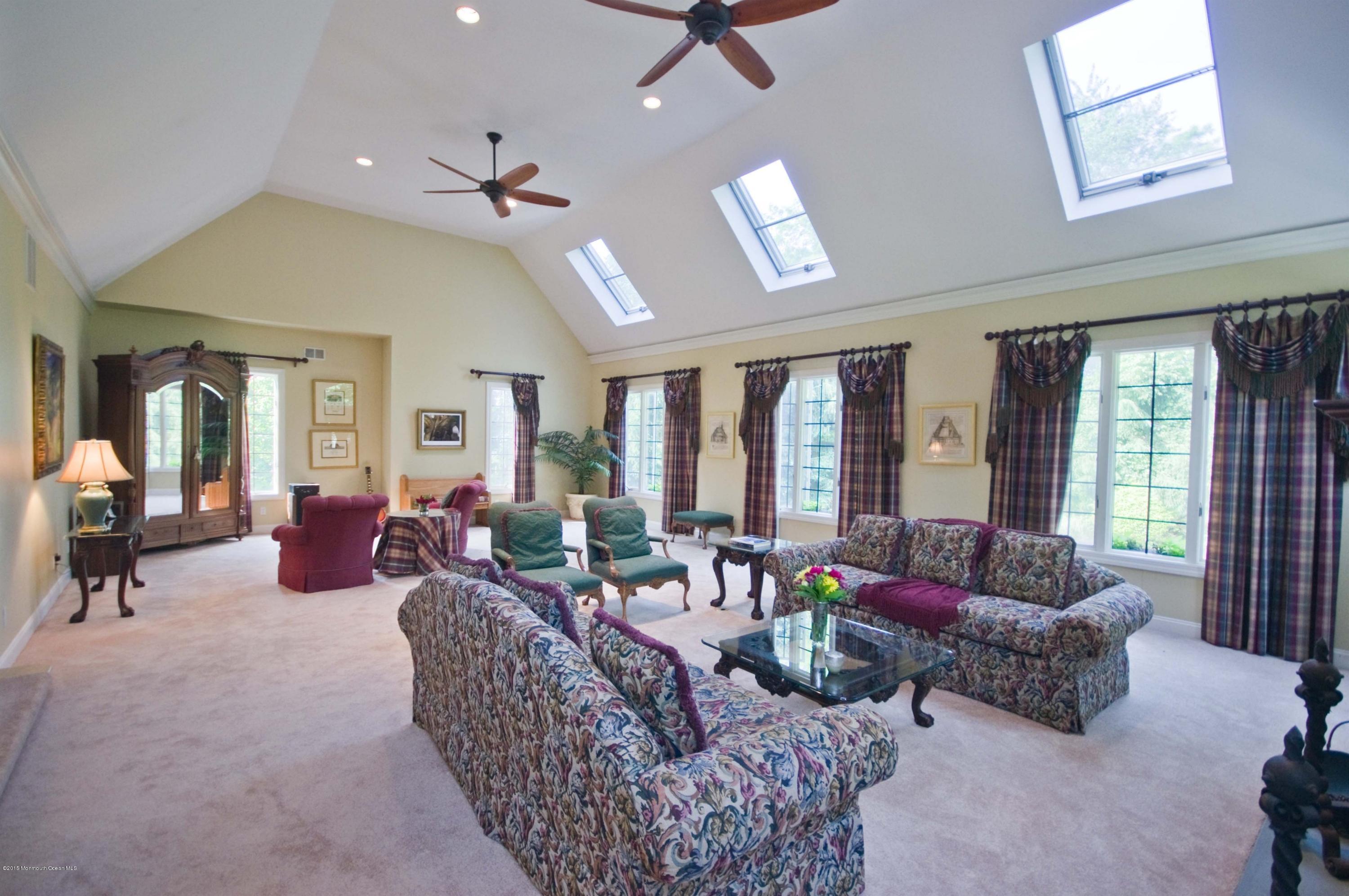 48 Crow Hill Road Freehold, NJ 07728 - Photo 12 of 29 a living room with furniture and a large window