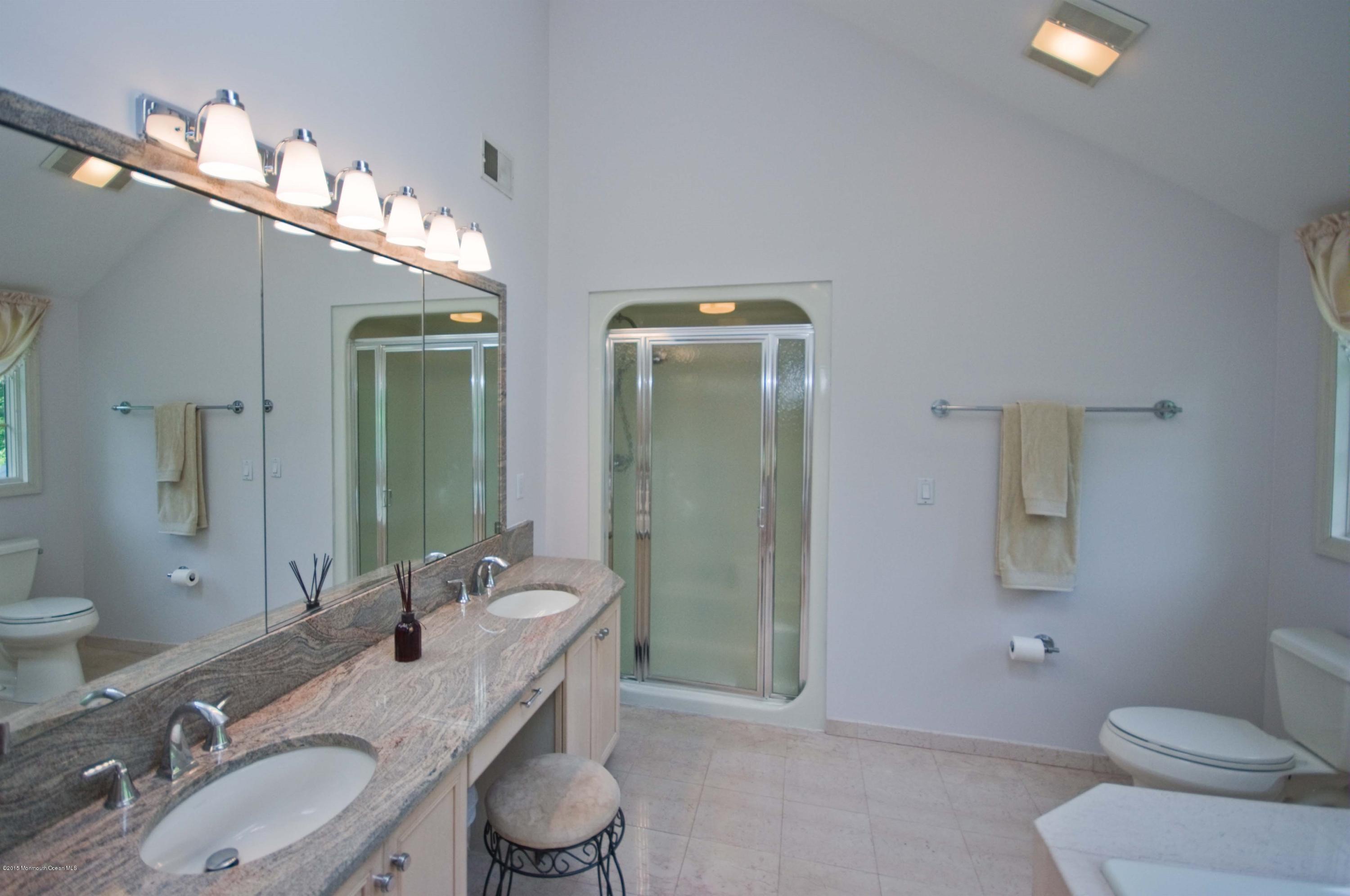 48 Crow Hill Road Freehold, NJ 07728 - Photo 16 of 29 a bathroom with a granite countertop sink mirror and toilet