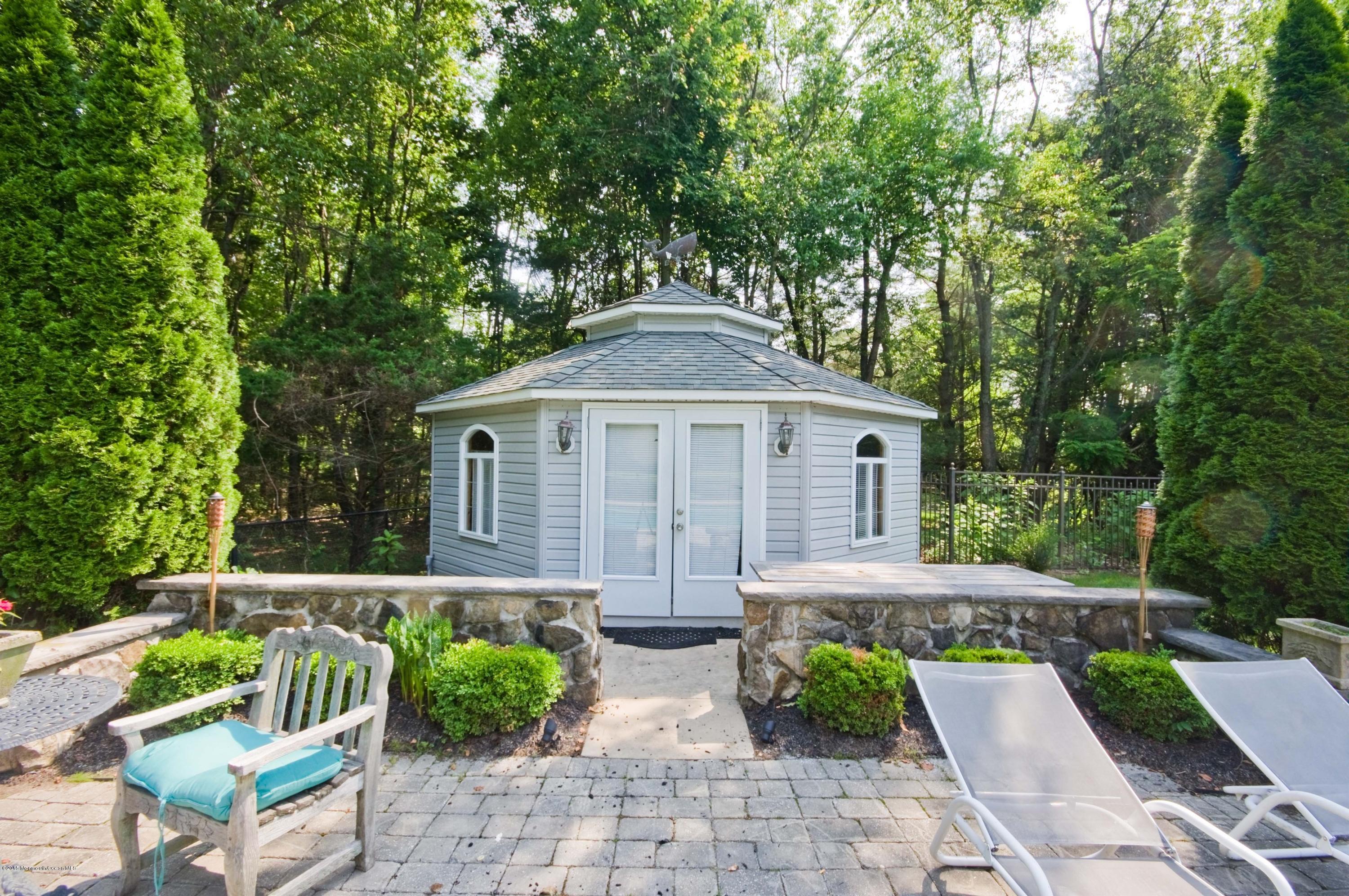 48 Crow Hill Road Freehold, NJ 07728 - Photo 24 of 29 a front view of a house with garden