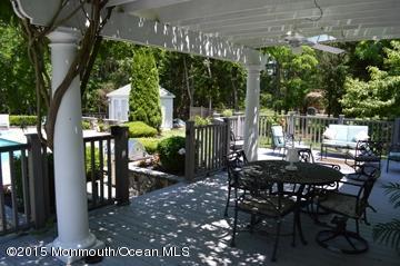 48 Crow Hill Road Freehold, NJ 07728 - Photo 29 of 29 a view of an outdoor dining space with a patio