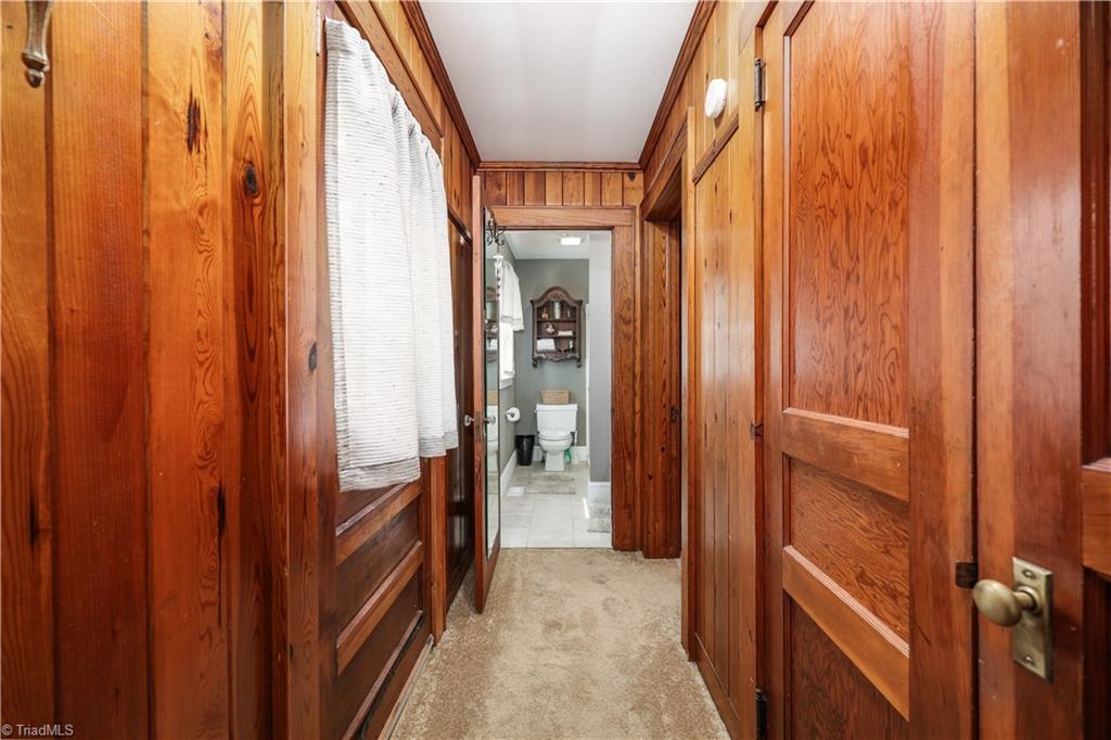 271 North Main Street Denton, NC 27239 - Photo 29 of 50 Hallway to separate bedroom and bath with outside entrance