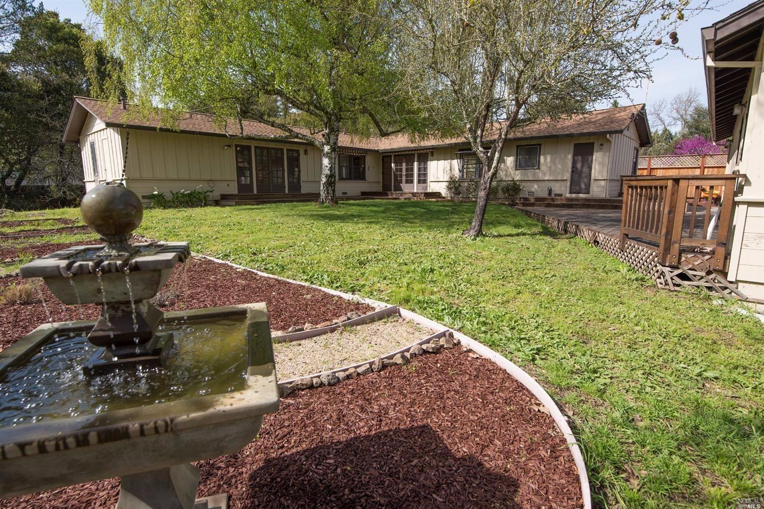 4346 Raymonde Way Santa Rosa, CA 95404 - Photo 1 of 1 a view of a house with backyard and sitting area
