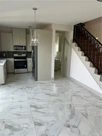 a view of a chandelier in a room