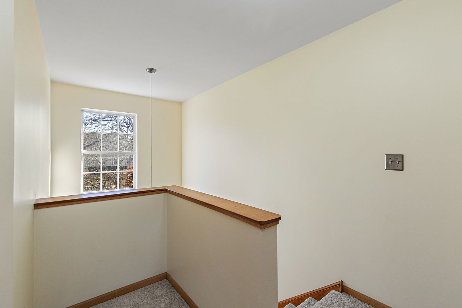 614 Littleton Trail Elgin, IL 60120 - Photo 17 of 29 a view of an empty room with a window