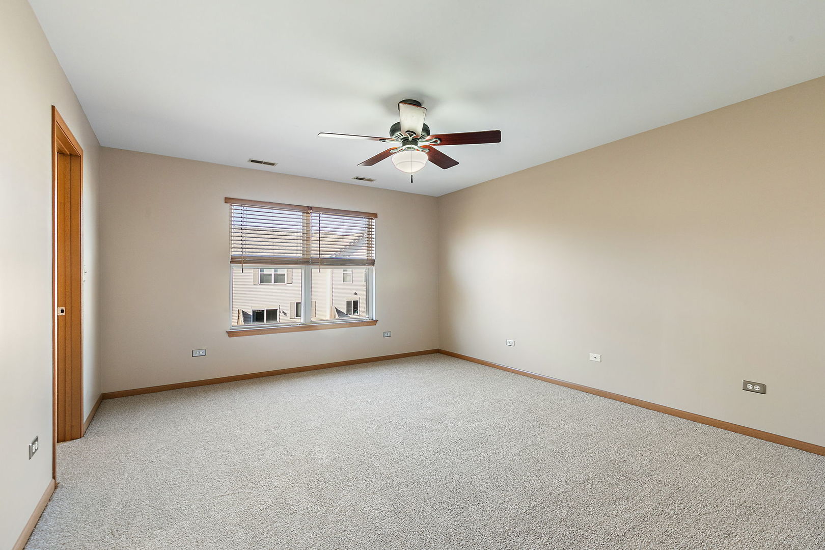 614 Littleton Trail Elgin, IL 60120 - Photo 22 of 29 wooden floor in an empty room with a window
