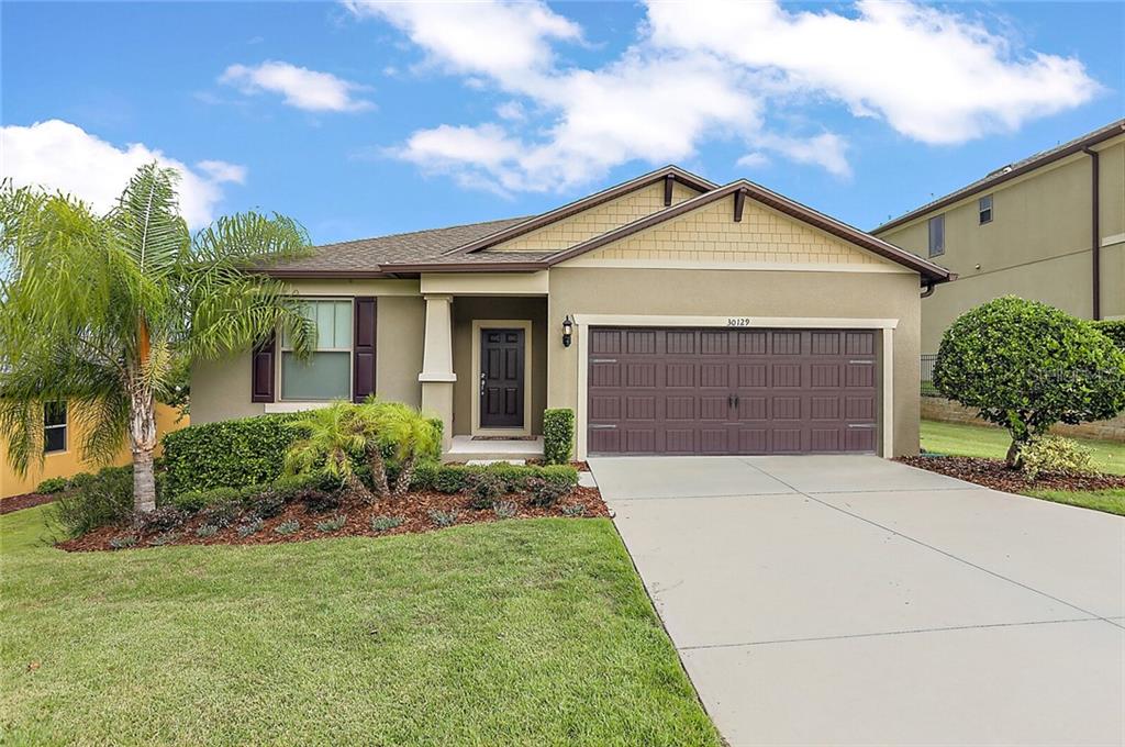 30129 Kladruby Point Mount Dora, FL 32757 - Photo 1 of 1 Fresh landscaping to welcome you home built in 2015, zoysia grass.