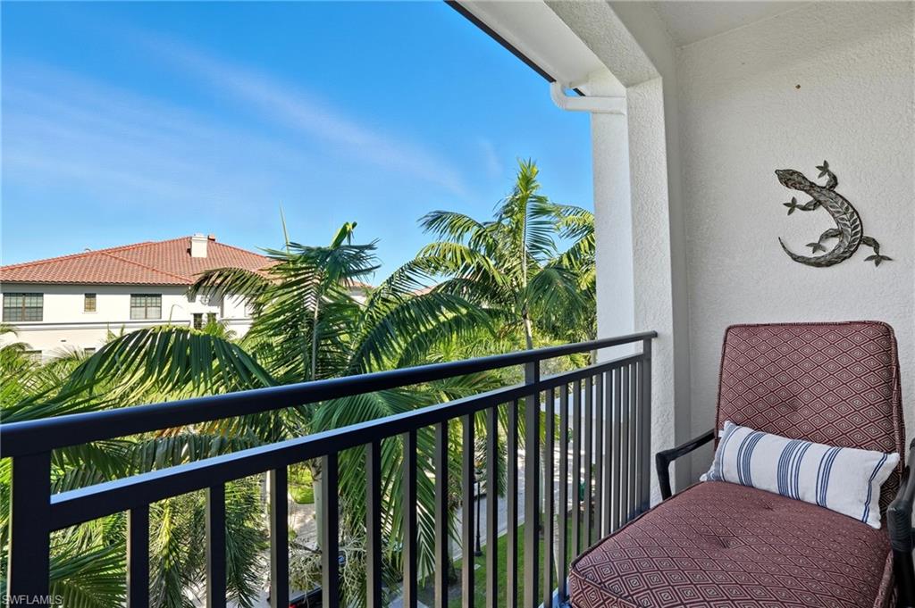 2546 Marquesa Royale Lane, Unit 7302 Naples, FL 34109 - Photo 31 of 46 a view of balcony with furniture