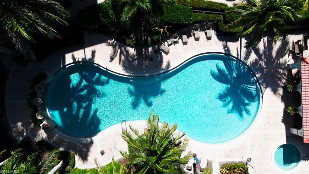 2546 Marquesa Royale Lane, Unit 7302 Naples, FL 34109 - Photo 43 of 46 a view of a yard in front of house