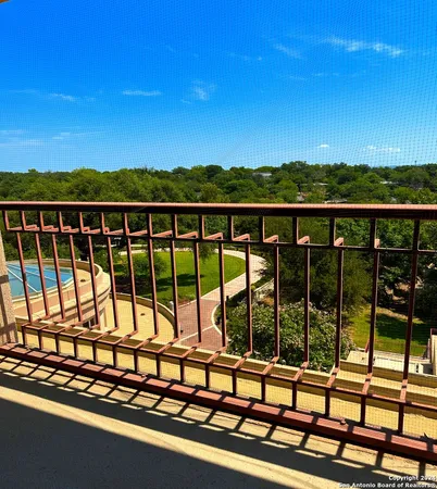 a view of a balcony with lake view