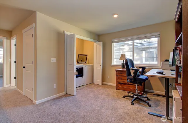 a view of a house with backyard