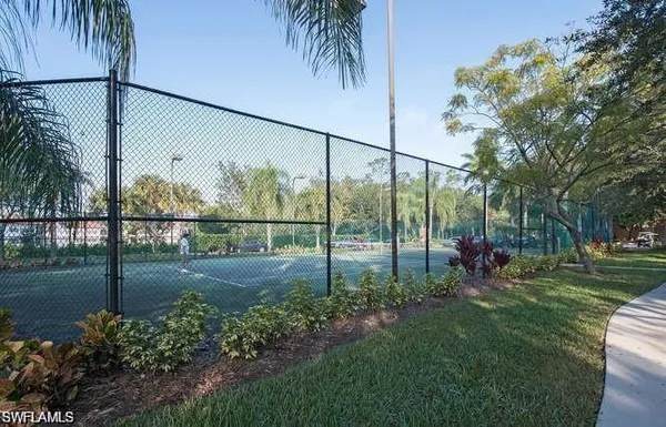 a view of a backyard with garden and plants