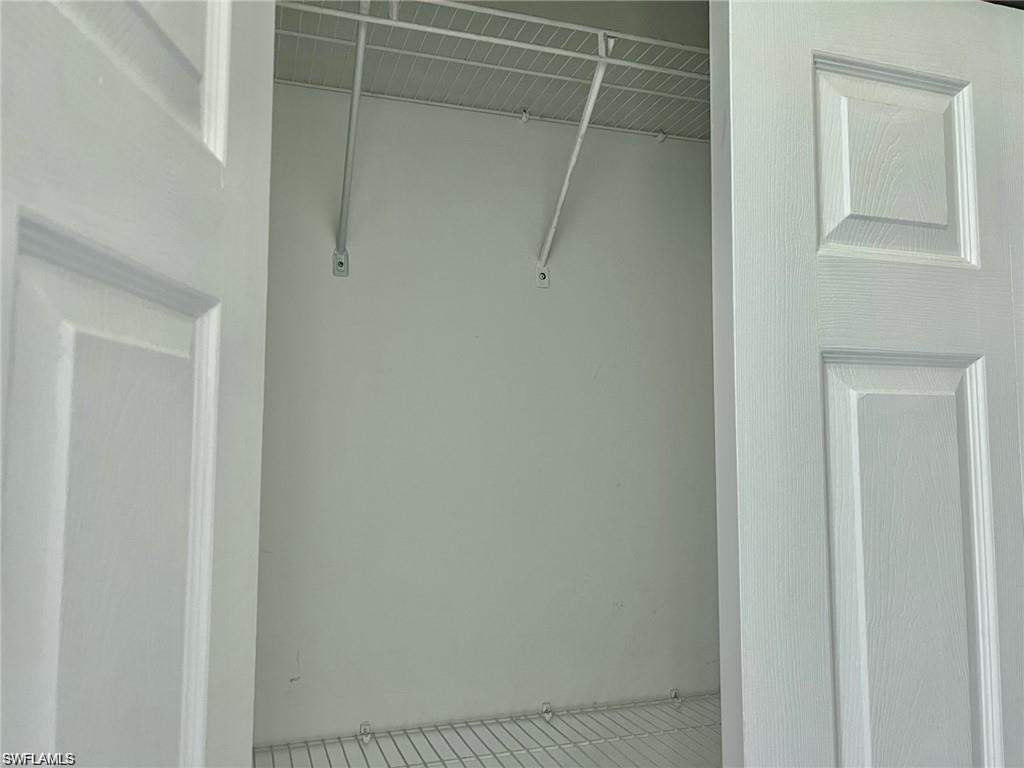 1115 Reserve Court, Unit 2201 Naples, FL 34105 - Photo 7 of 18 a close up view of a bathroom